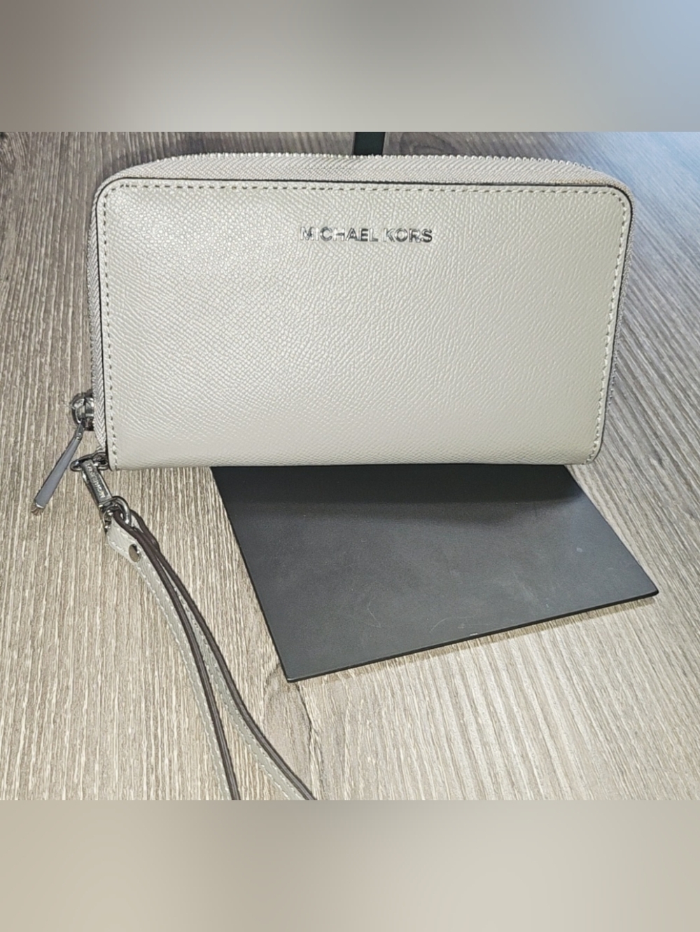 Authentic Michael Kors Zip Up Smartphone wristlet wallet in Stone Gray/silver